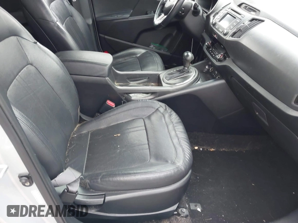 2013 Kia Sportage EX with VIN KNDPCCA22D7484936, listed as a IAAI auction lot 41921531 with 128,001 mi miles and . Bid and sale history available at DreamBid. Image 5.