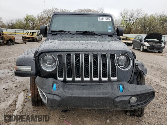 2023 Jeep Wrangler Sahara z VIN 1C4JJXP62PW514489, wystawiony jako Copart lot #51811585 z przebiegiem 39 174 mil mil oraz Szkoda całkowita • Salvage title. Historia ofert i sprzedaży dostępna na DreamBid. Obrazek 5.