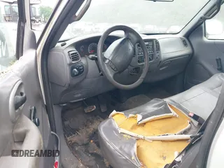 2001 Ford F-150 XL z VIN 1FTRX17L11NB54097, wystawiony jako IAAI lot #42353176 z przebiegiem 258 729 mil mil oraz . Historia ofert i sprzedaży dostępna na DreamBid. Obrazek 5.