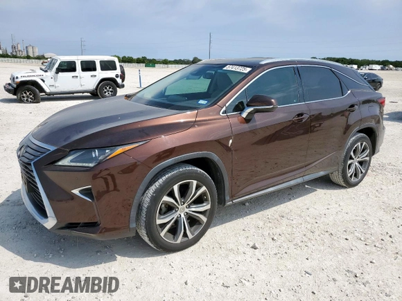 2017 Lexus RX 350 z VIN 2T2ZZMCA8HC077284, wystawiony jako Copart lot #57413725 z przebiegiem 70 616 mil mil oraz Czysty tytuł • Clean title. Historia ofert i sprzedaży dostępna na DreamBid. Obrazek 1.