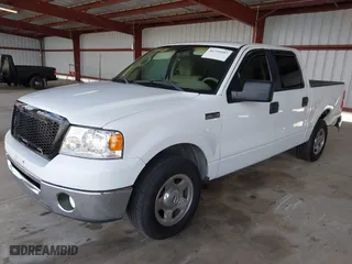 2007 Ford F-150 XLT with VIN 1FTPW12597KD31606, listed as a IAAI auction lot 41735597 with 196,934 mi miles. Bid and sale history available at carsss.com. Image 2.