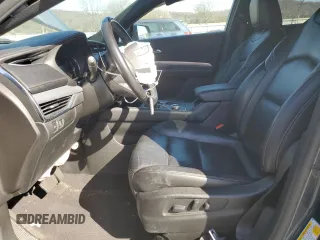 2021 Cadillac XT4 AWD Premium Luxury with VIN 1GYFZDR47MF002175, listed as a Copart auction lot 48303665 with 94,698 mi miles and Salvage Title. Bid and sale history available at carsss.com. Image 7.
