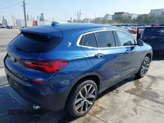 2022 BMW X2 xDrive28i z VIN WBXYJ1C02N5U85241, wystawiony jako IAAI lot #41965012 z przebiegiem 36 262 mil mil oraz . Historia ofert i sprzedaży dostępna na DreamBid. Obrazek 4.