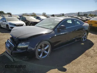 2009 Audi A5 with VIN WAUDK78T59A042042, listed as a Copart auction lot 75130974 with 104,520 mi miles and Salvage Title. Bid and sale history available at carsss.com. Image 1.
