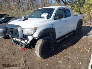 2007 Toyota Tundra SR5 with VIN 5TFBT54107X004759, listed as a IAAI auction lot 40944492 with 303,365 mi miles. Bid and sale history available at carsss.com. Image 2.