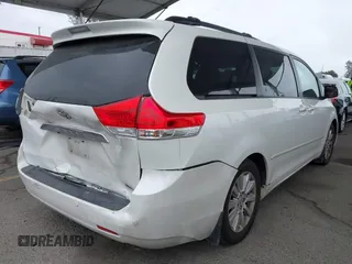 2011 Toyota Sienna XLE AAS with VIN 5TDYK3DC8BS148948, listed as a IAAI auction lot 41806293 with 144,645 mi miles and . Bid and sale history available at DreamBid. Image 4.