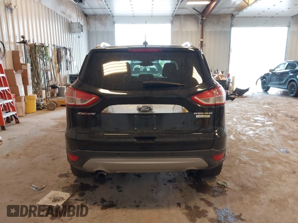 2016 Ford Escape Titanium with VIN 1FMCU0JX3GUB70607, listed as a IAAI auction lot 41727421 with 106,857 mi miles. Bid and sale history available at carsss.com. Image 17.