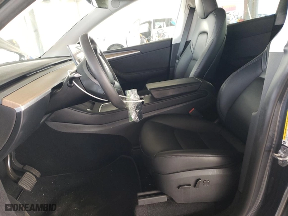 2023 Tesla Model Y Long Range with VIN 7SAYGDEEXPA137582, listed as a Copart auction lot 46869265 with 16,474 mi miles and Salvage Title. Bid and sale history available at carsss.com. Image 7.