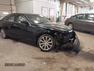 2016 Cadillac ATS Sedan Luxury Collection RWD with VIN 1G6AB5RX6G0113086, listed as a IAAI auction lot 41421552 with 105,528 mi miles. Bid and sale history available at carsss.com. Image 1.