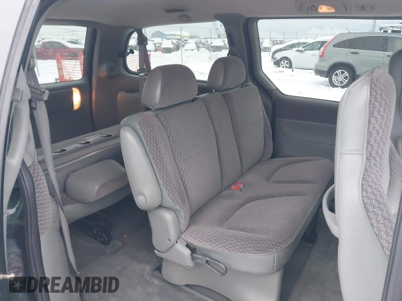 1999 Dodge Grand Caravan with VIN 1B4GT44LXXB609853, listed as a IAAI auction lot 41299906 with 211,337 mi miles and . Bid and sale history available at DreamBid. Image 8.