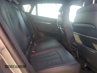2016 BMW X6 xDrive50i with VIN 5UXKU6C57G0R33958, listed as a Copart auction lot 49774065 with 124,226 mi miles and Salvage Title. Bid and sale history available at carsss.com. Image 11.