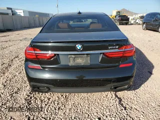 2018 BMW 7 Series 750i with VIN WBA7F0C57JGM23040, listed as a Copart auction lot 87392704 with 0 mi miles and Salvage Title. Bid and sale history available at carsss.com. Image 6.