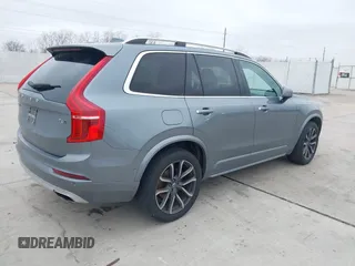 2016 Volvo XC90 T6 Momentum with VIN YV4A22PKXG1021392, listed as a IAAI auction lot 41413673 with 144,761 mi miles. Bid and sale history available at carsss.com. Image 4.