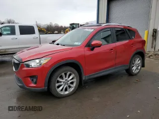 2015 Mazda CX-5 Grand Touring with VIN JM3KE4DY3F0510425, listed as a Copart auction lot 51784295 with 138,147 mi miles and Clean Title. Bid and sale history available at carsss.com. Image 1.