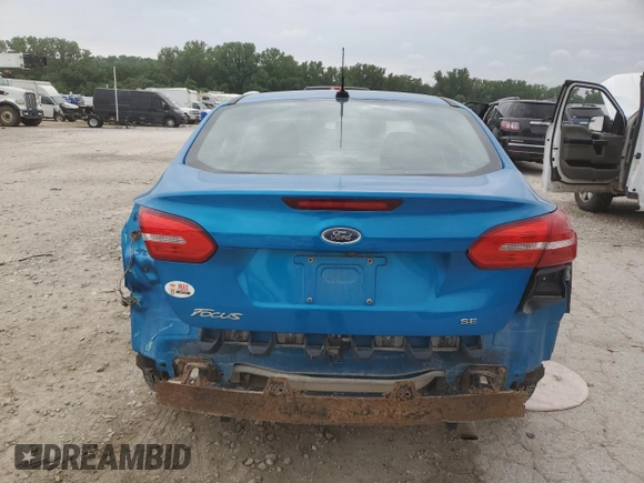 2017 Ford Focus SE with VIN 1FADP3F21HL219573, listed as a Copart auction lot 59147985 with 160,213 mi miles and Salvage title. Bid and sale history available at DreamBid. Image 6.