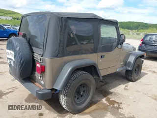2003 Jeep Wrangler SE with VIN 1J4FA29193P302424, listed as a IAAI auction lot 42179494 with 120,712 mi miles and . Bid and sale history available at DreamBid. Image 4.
