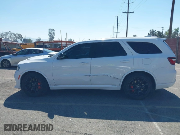 2021 Dodge Durango SRT Hellcat with VIN 1C4SDJH98MC822779, listed as a IAAI auction lot 41621673 with 44,953 mi miles and . Bid and sale history available at DreamBid. Image 14.
