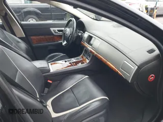 2015 Jaguar XF V6 Portfolio with VIN SAJWA0F77F8U65737, listed as a IAAI auction lot 42078529 with 62,229 mi miles. Bid and sale history available at carsss.com. Image 5.