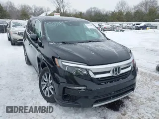 2019 Honda Pilot EX-L with VIN 5FNYF6H52KB051363, listed as a IAAI auction lot 41591540 with 109,860 mi miles. Bid and sale history available at carsss.com. Image 1.