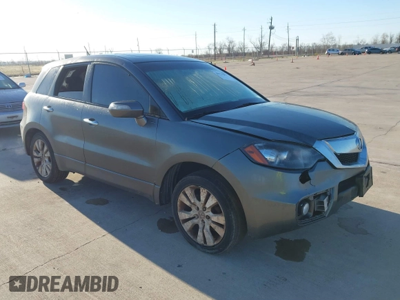 2012 Acura RDX Tech Pkg with VIN 5J8TB2H57CA000824, listed as a IAAI auction lot 41771611 with 265,417 mi miles. Bid and sale history available at carsss.com. Image 1.