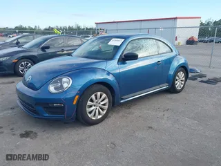 2018 Volkswagen Beetle S with VIN 3VWFD7AT5JM710121, listed as a IAAI auction lot 41264655 with 37,871 mi miles. Bid and sale history available at carsss.com. Image 2.