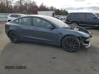 2023 Tesla Model 3 Performance z VIN 5YJ3E1EC4PF488873, wystawiony jako Copart lot #78991994 z przebiegiem 26 452 mil mil oraz Szkoda całkowita • Salvage title. Historia ofert i sprzedaży dostępna na DreamBid. Obrazek 4.