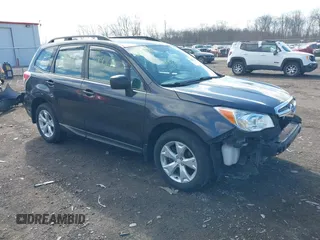2016 Subaru Forester 2.5i z VIN JF2SJABC6GH427053, wystawiony jako IAAI lot #41847680 z przebiegiem 117 557 mil mil oraz . Historia ofert i sprzedaży dostępna na DreamBid. Obrazek 1.