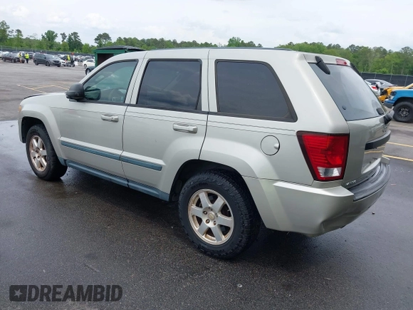 2008 Jeep Grand Cherokee Laredo with VIN 1J8GS48K58C105108, listed as a IAAI auction lot 42068055 with 201,272 mi miles. Bid and sale history available at carsss.com. Image 3.