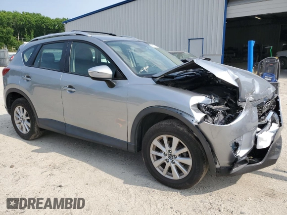 2015 Mazda CX-5 Sport with VIN JM3KE2BE4F0533273, listed as a Copart auction lot 60307795 with 120,484 mi miles and Salvage title. Bid and sale history available at DreamBid. Image 4.