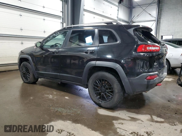 2014 Jeep Cherokee Trailhawk with VIN 1C4PJMBS5EW294212, listed as a Copart auction lot 88816885 with 151,779 mi miles and Salvage title. Bid and sale history available at DreamBid. Image 2.