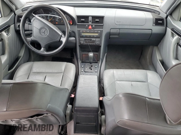1997 Mercedes-Benz C with VIN WDBHA28E3VF582237, listed as a Copart auction lot 76826534 with 240,702 mi miles and Clean Title. Bid and sale history available at carsss.com. Image 8.