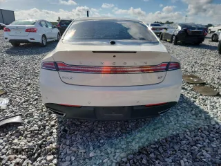 2013 Lincoln MKZ z VIN 3LN6L2GK1DR816558, wystawiony jako Copart lot #60424415 z przebiegiem 95 593 mil mil oraz Szkoda całkowita • Salvage title. Historia ofert i sprzedaży dostępna na DreamBid. Obrazek 6.
