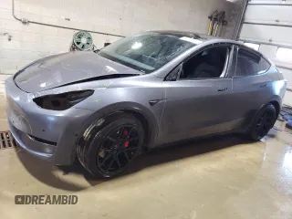2021 Tesla Model Y Performance with VIN 5YJYGDEF2MF134700, listed as a Copart auction lot 56325685 with 66,730 mi miles and Salvage Title. Bid and sale history available at DreamBid. Image 1.