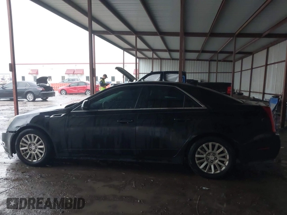 2012 Cadillac CTS Luxury with VIN 1G6DE5E59C0103526, listed as a IAAI auction lot 42200175 with 181,023 mi miles and . Bid and sale history available at DreamBid. Image 14.