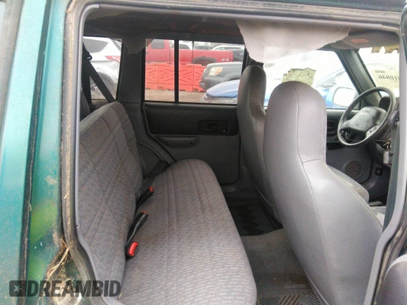 1997 Jeep Cherokee Sport with VIN 1J4FJ68S8VL500942, listed as a IAAI auction lot 40810846 with 224,782 mi miles. Bid and sale history available at carsss.com. Image 8.