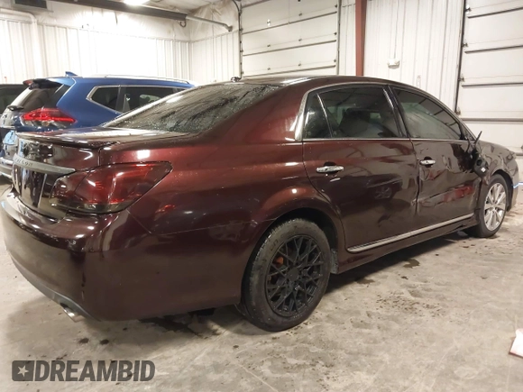 2011 Toyota Avalon with VIN 4T1BK3DB4BU433408, listed as a IAAI auction lot 40596175 with 123,529 mi miles and . Bid and sale history available at carsss.com. Image 4.