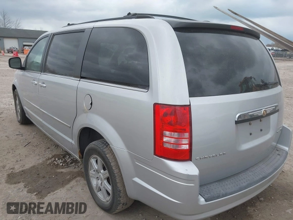 2010 Chrysler Town & Country Touring with VIN 2A4RR5D1XAR195748, listed as a IAAI auction lot 42029882 with 136,905 mi miles. Bid and sale history available at carsss.com. Image 3.