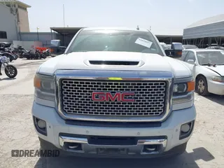 2017 GMC Sierra 2500HD Denali z VIN 1GT12UEY0HF111676, wystawiony jako IAAI lot #41834597 z przebiegiem 357 956 mil mil oraz . Historia ofert i sprzedaży dostępna na DreamBid. Obrazek 12.