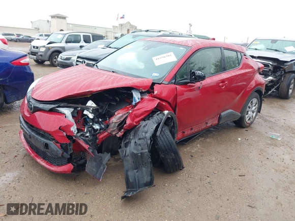 2020 Toyota C-HR LE with VIN JTNKHMBX4L1067648, listed as a IAAI auction lot 41556302 with 64,698 mi miles. Bid and sale history available at carsss.com. Image 16.