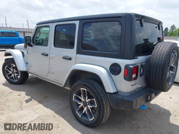2024 Jeep Wrangler Sport S with VIN 1C4RJXN60RW208013, listed as a IAAI auction lot 42117388 with 34,407 mi miles and . Bid and sale history available at DreamBid. Image 3.