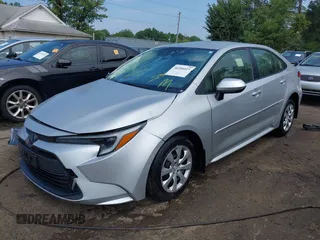 2023 Toyota Corolla Hybrid LE with VIN JTDBDMHE5P3000797, listed as a IAAI auction lot 40206015 with 22,371 mi miles. Bid and sale history available at carsss.com. Image 2.