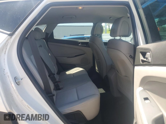 2018 Hyundai Tucson SEL z VIN KM8J33A43JU627313, wystawiony jako Copart lot #53834185 z przebiegiem 176 695 mil mil oraz Szkoda całkowita • Salvage title. Historia ofert i sprzedaży dostępna na DreamBid. Obrazek 11.