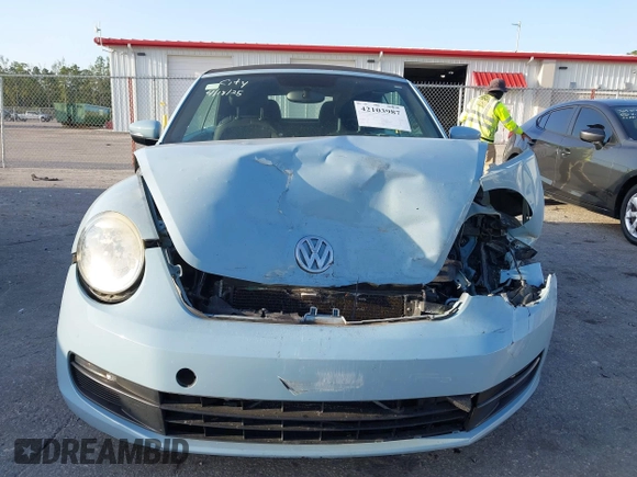 2013 Volkswagen Beetle 2.5L with VIN 3VW5P7AT0DM812482, listed as a IAAI auction lot 42103987 with 105,513 mi miles and . Bid and sale history available at DreamBid. Image 13.