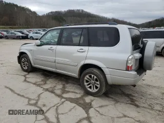 2005 Suzuki XL7 LX z VIN JS3TX92V654108114, wystawiony jako Copart lot #81158564 z przebiegiem 130 384 mil mil oraz Szkoda całkowita • Salvage title. Historia ofert i sprzedaży dostępna na DreamBid. Obrazek 2.