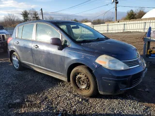 2007 Nissan Versa 1.8 S with VIN 3N1BC13E47L368792, listed as a Copart auction lot 43704395 with 37,572 mi miles and Salvage Title. Bid and sale history available at carsss.com. Image 4.