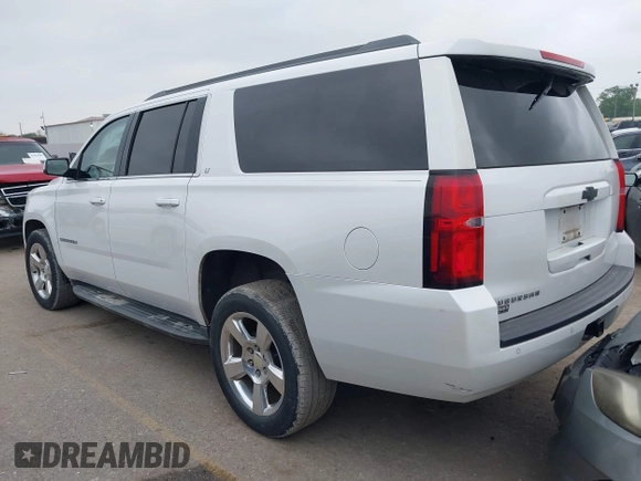 2016 Chevrolet Suburban LT with VIN 1GNSCHKC3GR161431, listed as a IAAI auction lot 41914038 with 117,028 mi miles and . Bid and sale history available at DreamBid. Image 3.