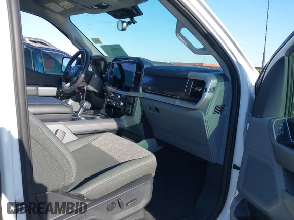 2023 Ford F-150 Lightning Pro with VIN 1FTVW1EL4PWG42578, listed as a IAAI auction lot 41992446 with 26,729 mi miles and . Bid and sale history available at DreamBid. Image 5.
