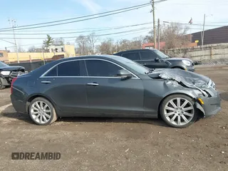 2014 Cadillac ATS Luxury AWD z VIN 1G6AH5RX6E0140302, wystawiony jako IAAI lot #41843454 z przebiegiem 125 388 mil mil oraz . Historia ofert i sprzedaży dostępna na DreamBid. Obrazek 13.