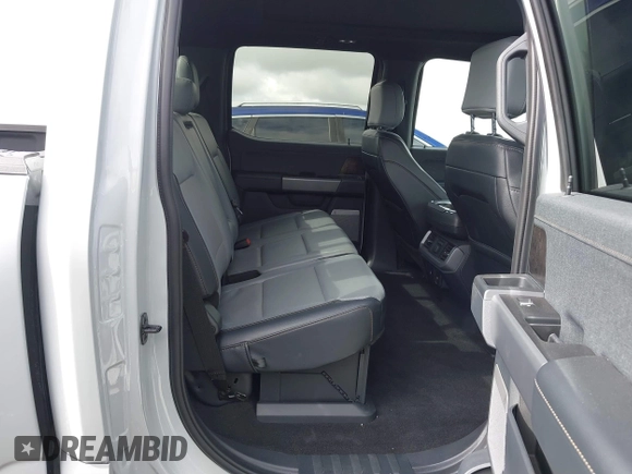 2023 Ford F-150 Lightning Pro with VIN 1FTVW1EV3PWG60491, listed as a IAAI auction lot 41507485 with 19,148 mi miles and . Bid and sale history available at DreamBid. Image 8.