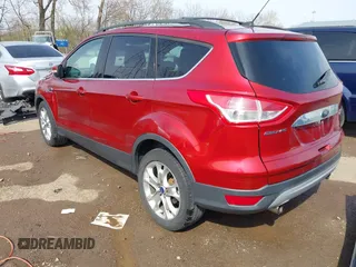 2013 Ford Escape SEL with VIN 1FMCU0H97DUA28747, listed as a IAAI auction lot 41932894 with 165,878 mi miles. Bid and sale history available at carsss.com. Image 3.